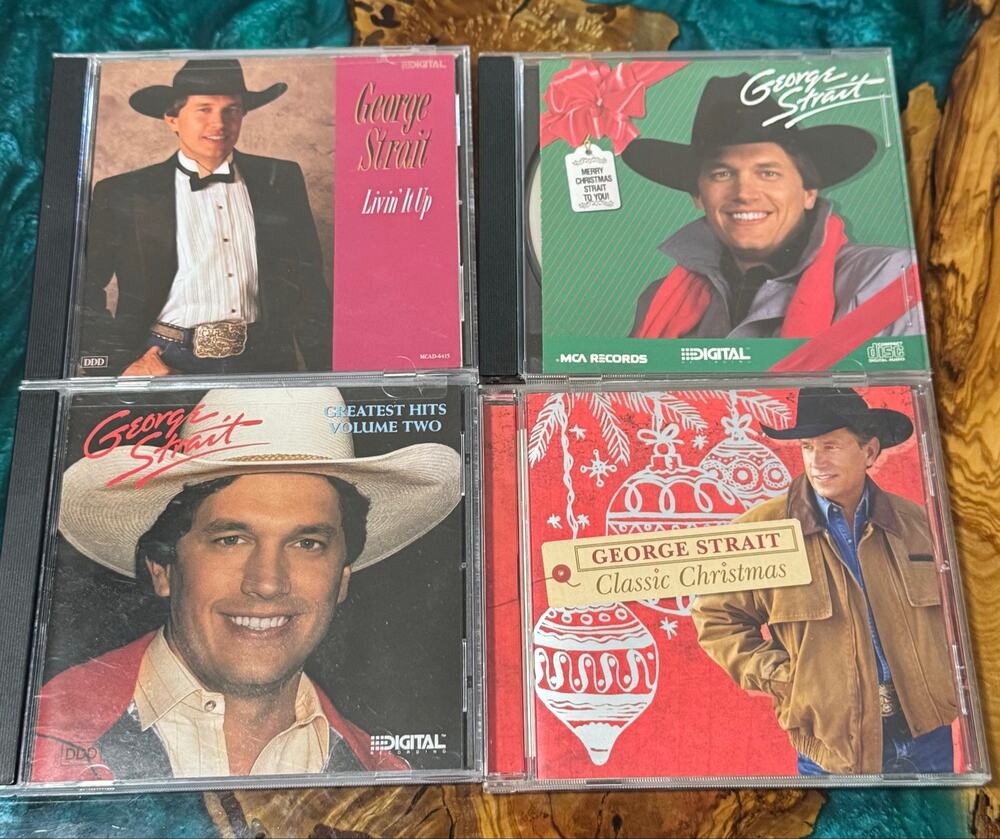 Four George Strait Music CDs : Greatest Hits 2 & Livin it up